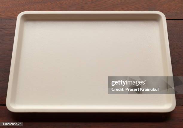 empty tray on wood table. top view - serving tray stock pictures, royalty-free photos & images