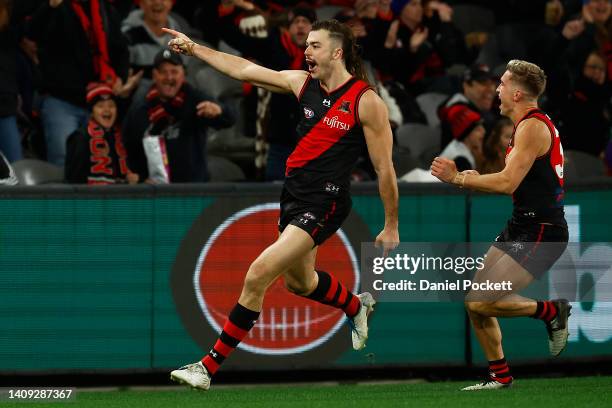 Sam Draper of the Bombers celebrates kicking a goal during the round 18 AFL match between the Essendon Bombers and the Gold Coast Suns at Marvel...