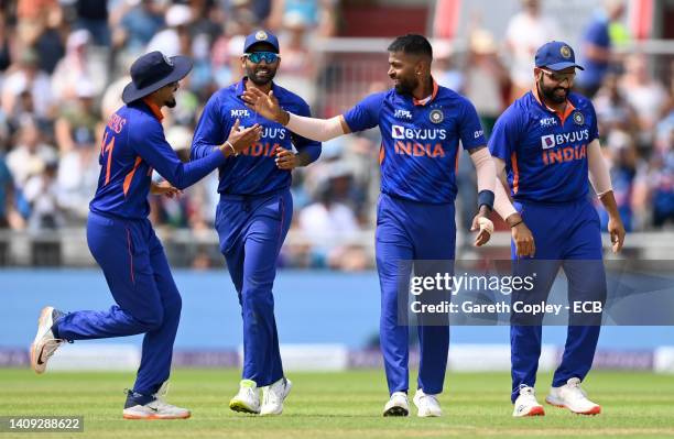 Hardik Pandya of India celebrates with teammates after dismissing England captain Jos Buttler during the 3rd Royal London Series One Day...