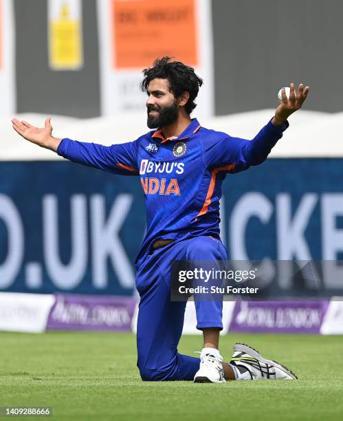 India fielder Ravindra Jadeja celebrates after catching out England batsman Jos Buttler during the 3rd Royal London Series One Day International...
