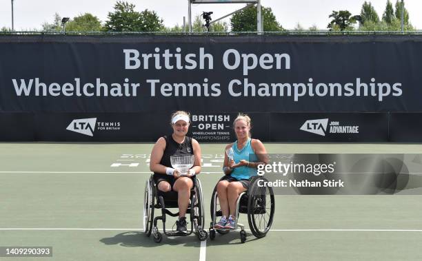 Aniek Van Koot of Netherlands poses with the British Open woman's singles trophy after beating Lucy Shuker of Great Britain during day six of the...