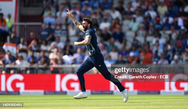 Reece Topley of England celebrates dismissing Shikhar Dhawan of India during the 3rd Royal London Series One Day International match between England...