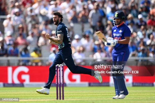 Reece Topley of England celebrates dismissing Shikhar Dhawan of India during the 3rd Royal London Series One Day International match between England...