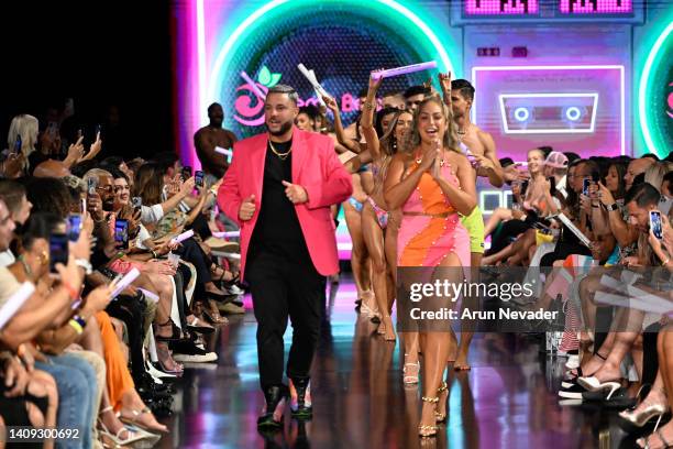 Designers Robert Gonzalez and Melanie Gonzalez walk the runway during Berry Beachy Swim + Papi Swim at Miami Swim Week Powered by Art Hearts Fashion...