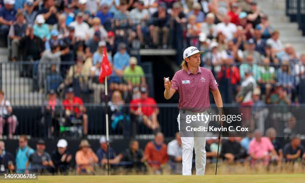 Cameron Smith of Australia acknowledges the crowd on the 2nd green during Day Four of The 150th Open at St Andrews Old Course on July 17, 2022 in St...