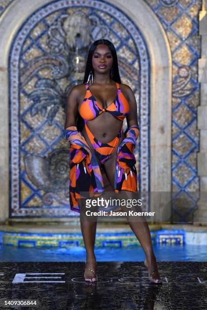 Model walks the runway during Matte Collection At Miami Swim Week at The Villa Casa Casuarina at the former Versace Mansion on July 16, 2022 in Miami...