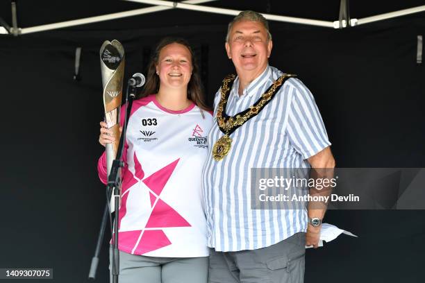 Baton bearer Ruth Williams poses with Councillor Graham Emmett, Mayor of Northwich and the Queen's Baton during the Birmingham 2022 Queen's Baton...
