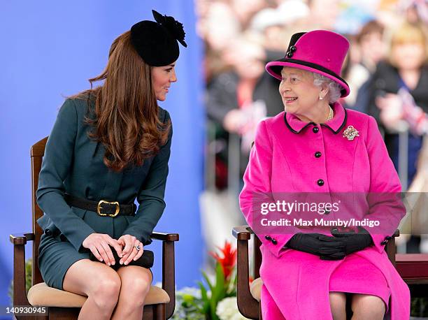 Catherine, Duchess of Cambridge and Queen Elizabeth II listen to a speech as they and Prince Philip, Duke of Edinburgh visit Leicester on the first...