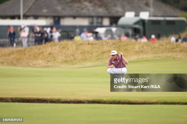 Cameron Smith of Australia lines up a putt on the 1st green during Day Four of The 150th Open at St Andrews Old Course on July 17, 2022 in St...