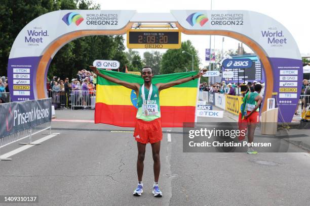 Tamirat Tola of Team Ethiopia celebrates winning gold in the Men's Marathon on day three of the World Athletics Championships Oregon22 at Hayward...