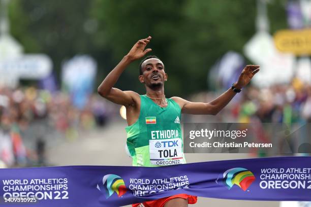 Tamirat Tola of Team Ethiopia crosses the finish line to win gold in the Men's Marathon on day three of the World Athletics Championships Oregon22 at...