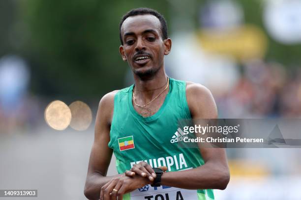 Tamirat Tola of Team Ethiopia runs to the finish line to win gold in the Men's Marathon on day three of the World Athletics Championships Oregon22 at...