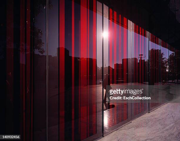 colorful glass facade reflecting city life - australia colour stock-fotos und bilder
