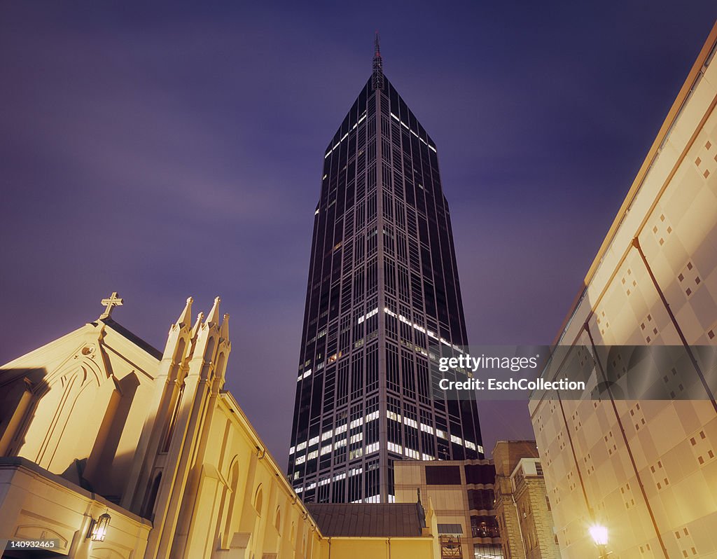 Church with modern office building in the back