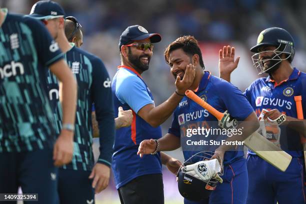 India batsman Rishabh Pant is congratulated by team mates after hitting the winning runs during the 3rd Royal London Series One Day International...