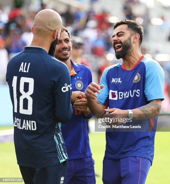 Moeen Ali of England and Virat Kohli and Yuzvendra Chahal of India share a joke, after during the 3rd Royal London Series One Day International...