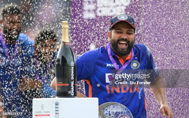 India captain Rohit Sharma celebrates by being sprayed with champagne after the 3rd Royal London Series One Day International match between England...