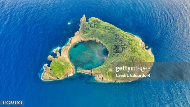 sao miguel island, azores, portugal. top view of islet of vila franca do campo. azores aerial panoramic view. crater of an old underwater volcano. bird eye view - azores 個照片及圖片檔