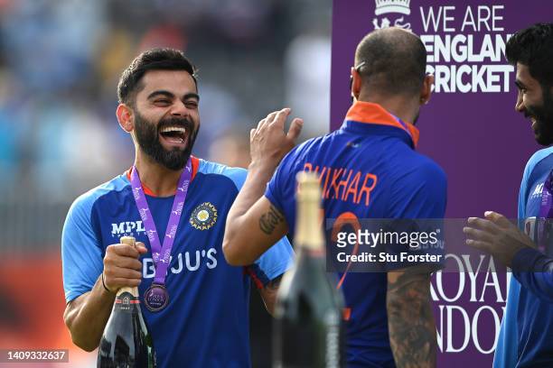 India batsman Virat Kohli shares a joke with Shikhar Dhawan after the 3rd Royal London Series One Day International match between England and India...