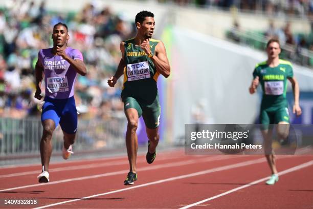 Alex Haydock-Wilson of Team Great Britain, Wayde van Niekerk of Team South Africa, and Steven Solomon of Team Australia compete in the Men's 400m...