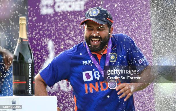 India captain Rohit Sharma celebrates by being sprayed with champagne after the 3rd Royal London Series One Day International match between England...
