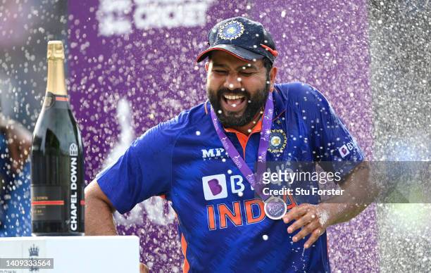 India captain Rohit Sharma celebrates by being sprayed with champagne after the 3rd Royal London Series One Day International match between England...