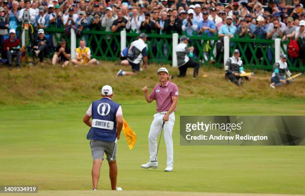 Cameron Smith of Australia celebrates on the 18th green during Day Four of The 150th Open at St Andrews Old Course on July 17, 2022 in St Andrews,...