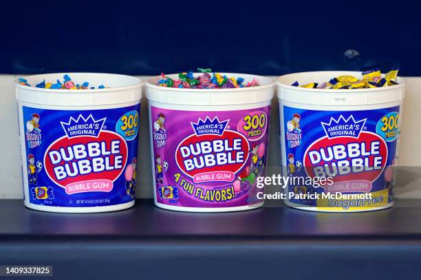 Three buckets of Dubble Bubble bubble gum in the Milwaukee Brewers dugout before a game against the Pittsburgh Pirates at American Family Field on...