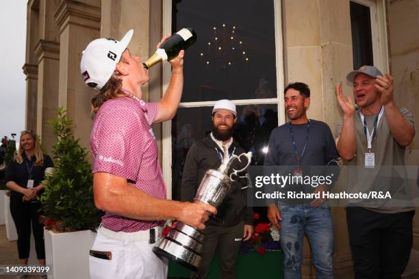 Cameron Smith of Australia celebrates outside the R&A Clubhouse following victory on Day Four of The 150th Open at St Andrews Old Course on July 17,...