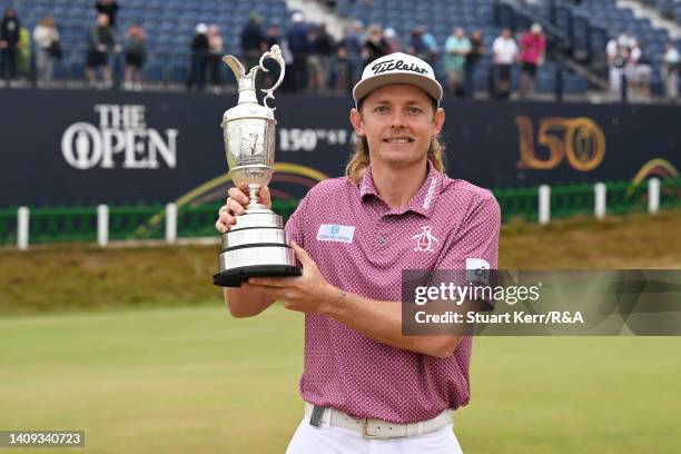 Cameron Smith of Australia poses with The Claret Jug in celebration of victory on the eighteenth green during Day Four of The 150th Open at St...