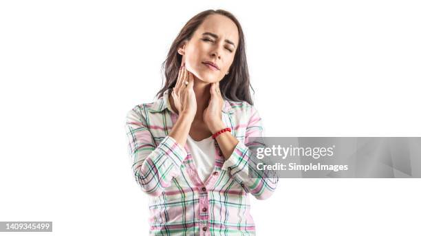 women with thyroid gland problem with hands holding throat. isolated on white. - thyroid gland stock-fotos und bilder