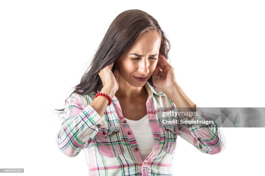 Young woman have tinnitus,noise whistling in her ears. Isolted on white.