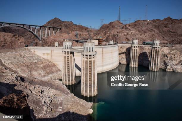 The Hoover Dam water intake towers at Lake Mead, the country's largest man-made water reservoir, formed by the dam on the Colorado River in the...