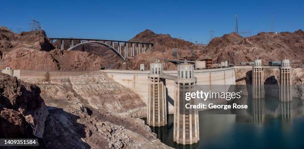 The Hoover Dam water intake towers at Lake Mead, the country's largest man-made water reservoir, formed by the dam on the Colorado River in the...