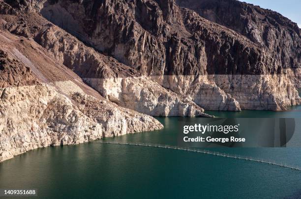 Bathtub ring watermark at Hoover Dam/Lake Mead, the country's largest man-made water reservoir, formed by the dam on the Colorado River in the...