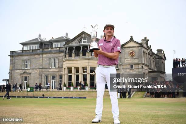 Cameron Smith of Australia poses with The Claret Jug in celebration of victory on the eighteenth green during Day Four of The 150th Open at St...