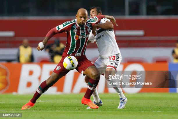 Felipe Melo of Fluminense fights for the ball with Eder of Sao Paulo during the match between Sao Paulo and Fluminense as part of Brasileirao Series...