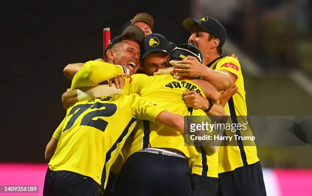 Players of Hampshire Hawks celebrate as team mate Nathan Ellis takes the wicket of Richard Gleeson of Lancashire Lightning which is later given as a...
