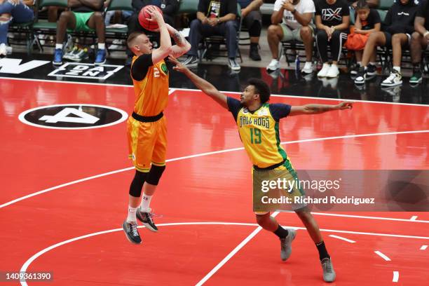 Karlis Lasmanis of the Aliens shoots over Leandro Barbosa of the Ball Hogs during the game in BIG3 Week 5 at Comerica Center on July 17, 2022 in...