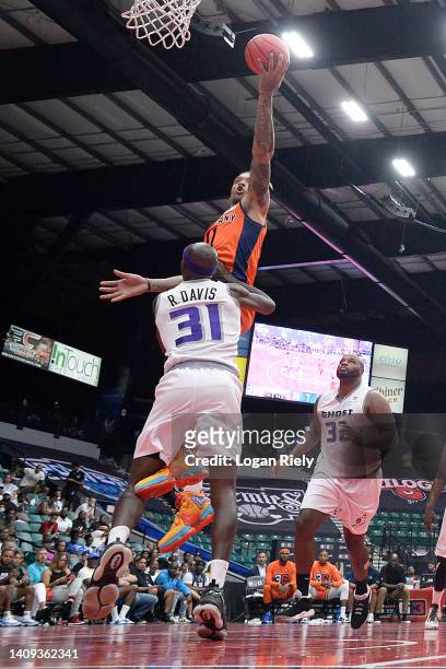Michael Beasley of 3's Company shoots over Ricky Davis of the Ghost Ballers during the game in BIG3 Week 5 at Comerica Center on July 17, 2022 in...