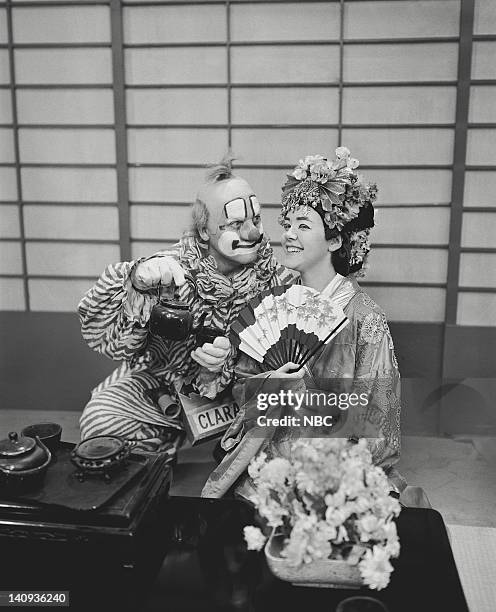 Pictured: Lew Anderson as Clarabell the Clown, Marti Barris as a geisha -- Photo by: NBCU Photo Bank