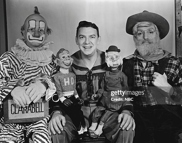 Pictured: Robert Nicholson as Clarabell the Clown, Howdy Doody, Bob Smith as Buffalo Bob Smith, Phineas T. Bluster, Bill LeCornec as Oil Well Willie...