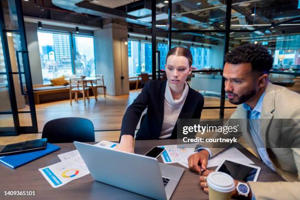 two business people meeting in the office. - accounting firm stock pictures, royalty-free photos & images