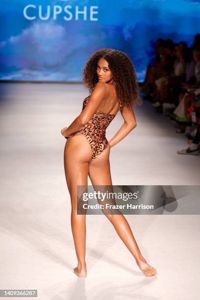 Model walks the runway for Cupshe x Jojo Fletcher Collection during Paraiso Miami Beach Beach Resort 2023 at The Paraiso Tent on July 17, 2022 in...