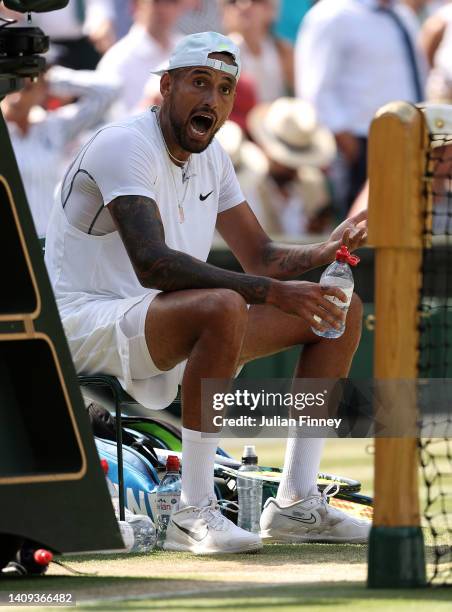 Nick Kyrgios of Australia reacts at the change of ends against Novak Djokovic of Serbia during their Men's Singles Final match on day fourteen of The...