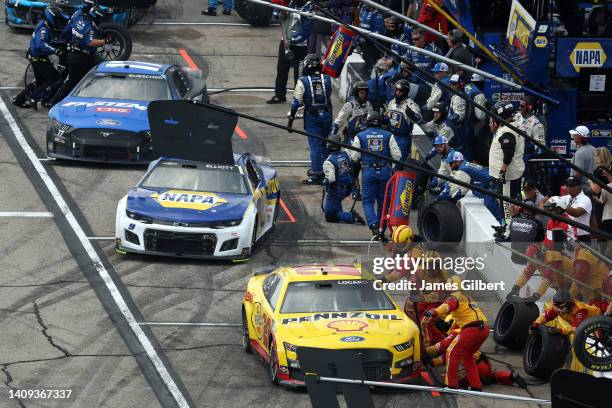 Joey Logano, driver of the Shell Pennzoil Ford, pits during the NASCAR Cup Series Ambetter 301 at New Hampshire Motor Speedway on July 17, 2022 in...