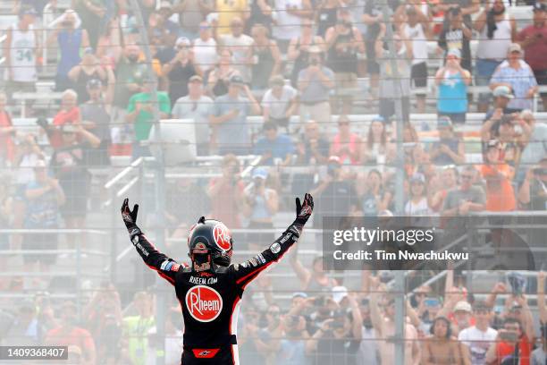 Christopher Bell, driver of the Rheem/WATTS Toyota, celebrates after winning the NASCAR Cup Series Ambetter 301 at New Hampshire Motor Speedway on...