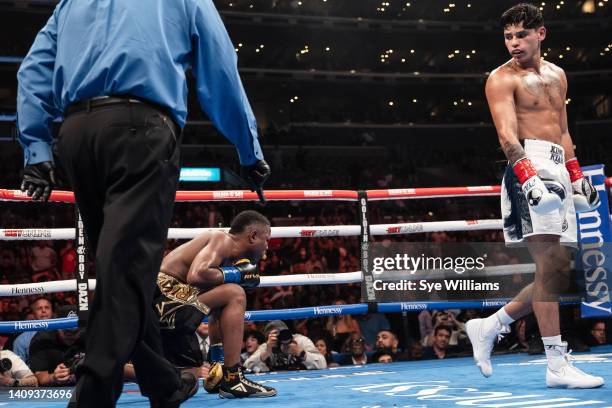 Ryan Garcia knocks Javier Fortuna down during their Super Light weight 12 rounds fight at Crypto.com Arena on July 16, 2022 in Los Angeles,...