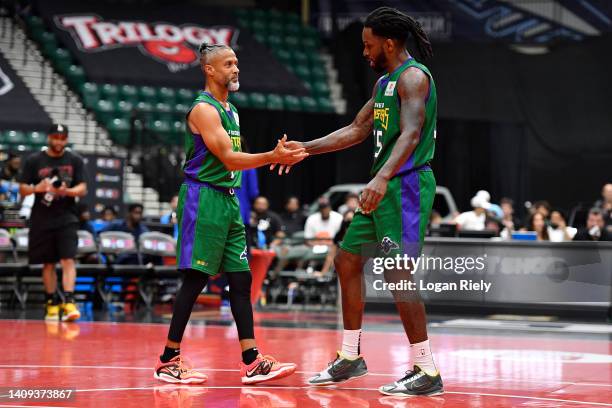 Mahmoud Abdul-Rauf of the 3 Headed Monsters and Kevin Murphy of the 3 Headed Monsters shake hands after the game against the Triplets in BIG3 Week 5...