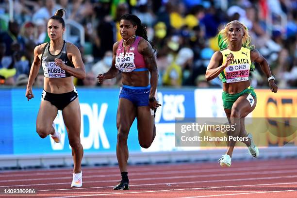 Zoe Hobbs of Team New Zealand, Aleia Hobbs of Team United States and Shelly-Ann Fraser-Pryce of Team Jamaica compete in the Women's 100m Semi-Final...